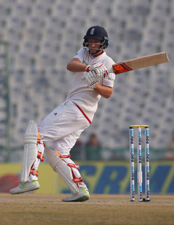 Cricket - India v England - Third Test cricket match - Punjab Cricket Association Stadium, Mohali, India - 29/11/16. England's Joe Root plays a shot. REUTERS/Adnan Abidi