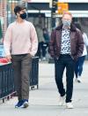 <p>Justin Mikita and Jesse Tyler Ferguson take a walk in N.Y.C. together on Wednesday. </p>