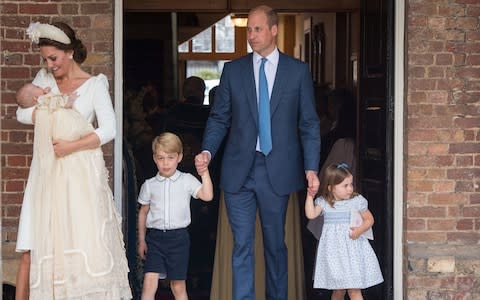 The Duke of Cambridge with his young family - Credit: Reuters
