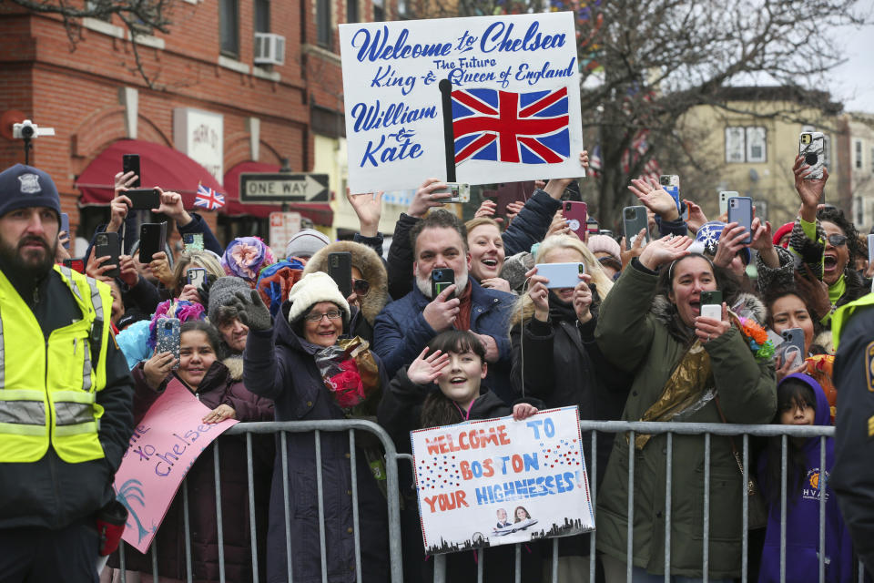 The crowd awaits Britain's Prince William and Kate, Princess of Wales, outside of Roca Thursday, Dec. 1, 2022, in Chelsea, Mass. (AP Photo/Reba Saldanha, Pool)