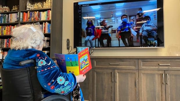 Lee Eisler, a retired Grade 1 teacher, would visit the daycare children in her building before the pandemic began. Now, she still reads to them virtually.