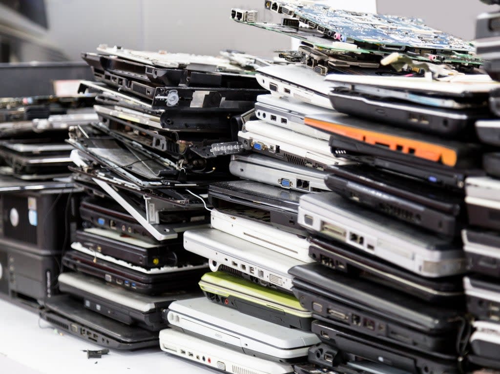 Each tonne of electronic waste that goes unrecycled has a carbon footprint of two tonnes (Getty)