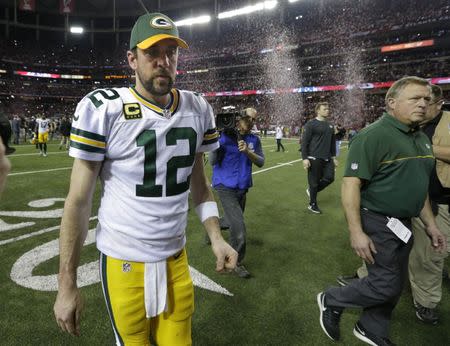 Jan 22, 2017; Atlanta, GA, USA; Green Bay Packers quarterback Aaron Rodgers (12) walks off the field after losing to the Atlanta Falcons in the 2017 NFC Championship Game at the Georgia Dome. Mandatory Credit: Rick Wood/Milwaukee Journal Sentinel via USA TODAY NETWORK