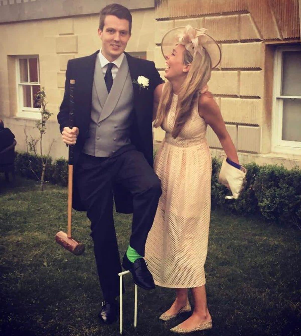 Carrie Johnson laughs with friend Ben Mallet, pictured with a croquet mallet, at a friend’s wedding in 2016 (Carrie Johnson/Instagram)