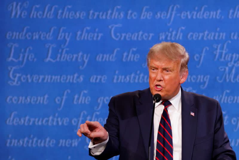 U.S. President Donald Trump and Democratic presidential nominee Joe Biden participate in their first 2020 presidential campaign debate in Cleveland