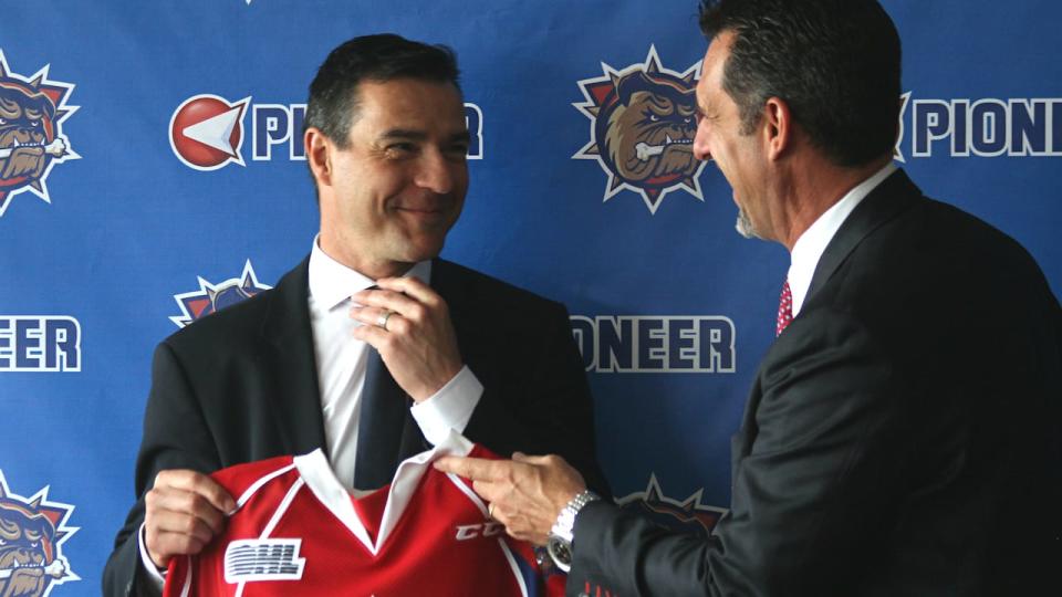 Steve Staios, left, was hired on as the Hamilton Bulldogs president in 2015 by Michael Andlauer, right. (Jeff Green/CBC - image credit)