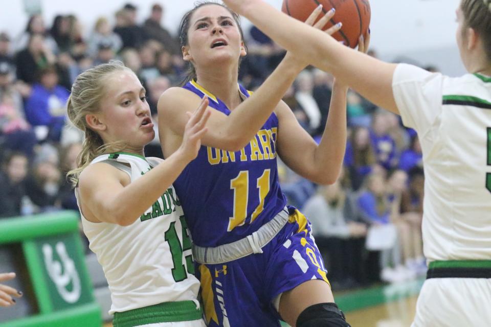 Ontario's Rylee Nigh takes the ball to the hoop during the Warriors' loss to Clear Fork on Friday night.