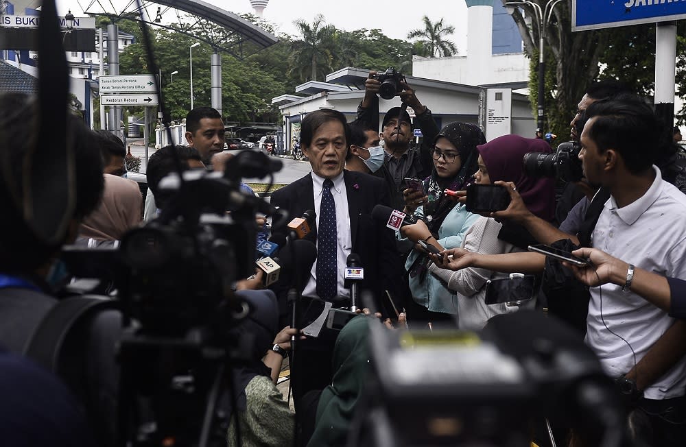 Al Jazeera lawyer Hisyam Teh Poh Teik speaks to reporters outside the Bukit Aman headquarters in Kuala Lumpur July 10, 2020. ― Picture by Miera Zulyana