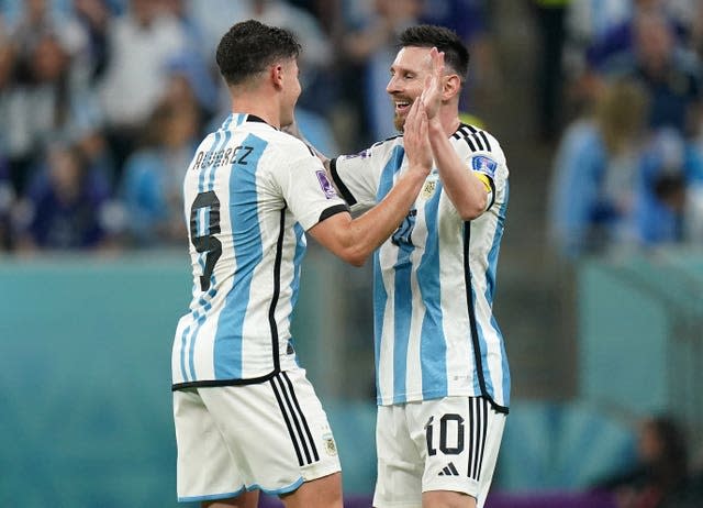 Julian Alvarez, left, celebrates with Lionel Messi after scoring against Croatia