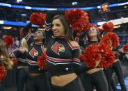 The Louisville dancers perform during the first half in a third-round game in the NCAA college basketball tournament against Saint Louis, Saturday, March 22, 2014, in Orlando, Fla. (AP Photo/Phelan M. Ebenhack)