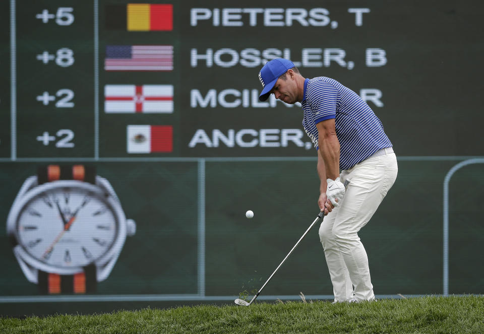 Paul Casey of England chips onto the 18th green during the final round of the PGA Championship golf tournament, Sunday, May 19, 2019, at Bethpage Black in Farmingdale, N.Y. (AP Photo/Seth Wenig)