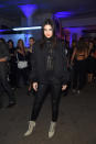 <p>Jenner—in an Issey Miyake top, bomber jacket, leather pants and suede lace-up booties—let off steam in style at the Givenchy party after walking the runway just a few hours earlier. </p>