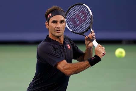 Aug 14, 2018; Mason, OH, USA; Roger Federer (SUI) returns a shot against Peter Gojowczyk (GER) in the Western and Southern tennis open at Lindner Family Tennis Center. Aaron Doster-USA TODAY Sports