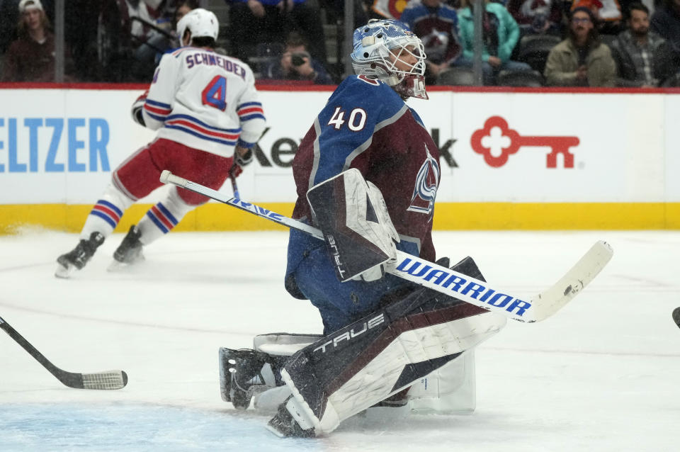 Colorado Avalanche goaltender Alexandar Georgiev (4) reacts after giving up a goal to New York Rangers defenseman Braden Schneider (4) in the second period of an NHL hockey game Friday, Dec. 9, 2022, in Denver. (AP Photo/David Zalubowski)