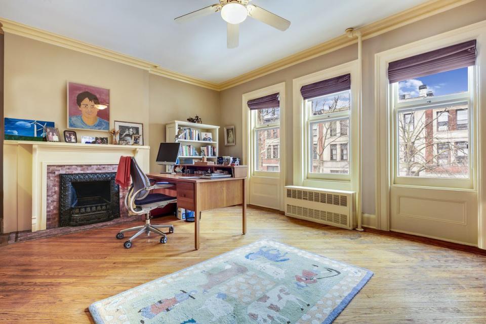 BEFORE: Once used as an office, the ample but underutilized master bedroom “looked as if time had worn and discolored the space,” Sheena says.