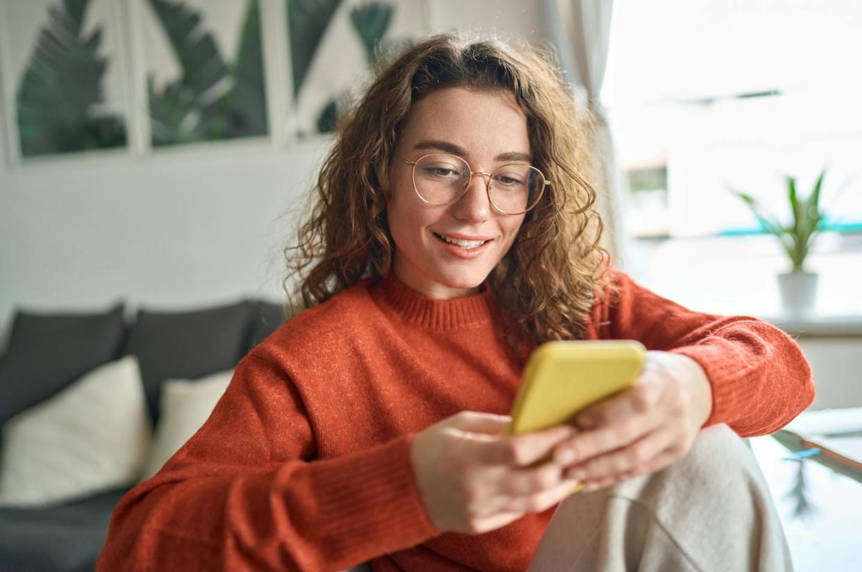 <a href="https://www.shutterstock.com/image-photo/young-smiling-woman-wearing-glasses-holding-2250703231" rel="nofollow noopener" target="_blank" data-ylk="slk:insta_photos/Shutterstock;elm:context_link;itc:0;sec:content-canvas" class="link ">insta_photos/Shutterstock</a>
