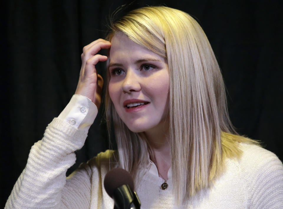 FILE - In this April 24, 2015, file photo, kidnapping survivor Elizabeth Smart looks on during a news conference in Sandy, Utah. Wanda Barzee, a woman convicted of helping a former street preacher kidnap Smart in 2002 will be freed from prison more than five years earlier than expected, a surprise decision that Smart called "incomprehensible" on Tuesday, Sept. 11, 2018. (AP Photo/Rick Bowmer, File)