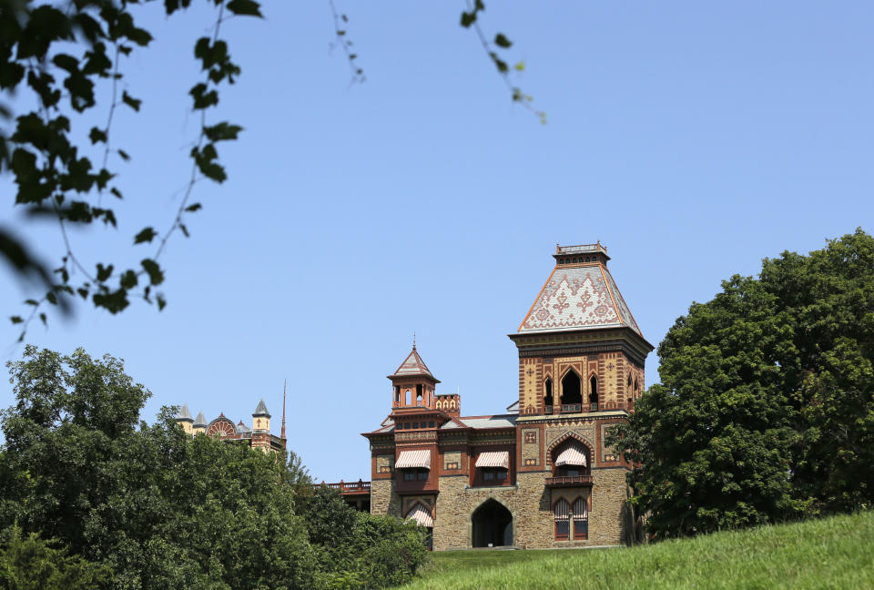 In this Wednesday, Aug. 21, 2013, photo, the home of artist Frederic Church is seen at Olana State Historic Site in Greenport, N.Y. Keeping t the view from the site unmarred by the trappings of modern technology is the focus of a legal fight over plans for a 190-foot emergency communications tower 2 miles from Church’s old estate, Olana. (AP Photo/Mike Groll)