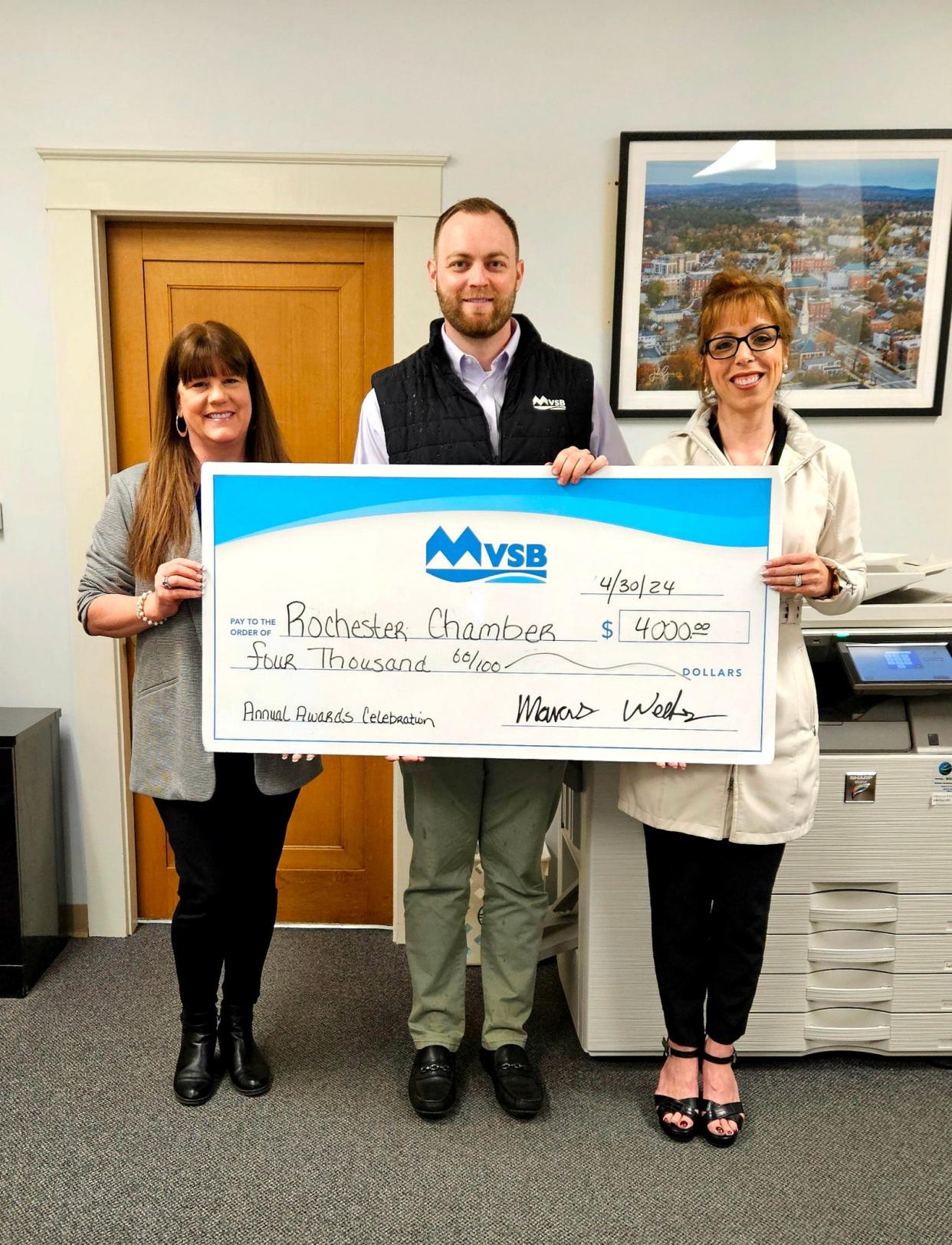 From left to right are Tanya Hervey, Greater Rochester Chamber of Commerce, Traynor Cully, Meredith Village Savings Bank, and Jolene Whitehead, Meredith Village Savings Bank.