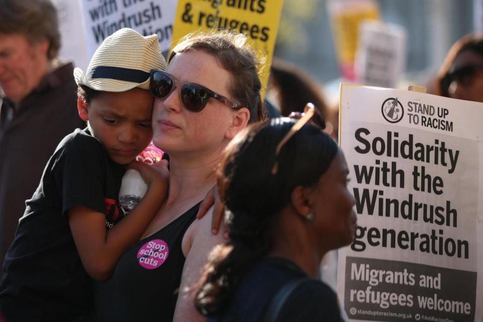 The rally called for 'amnesty for the Windrush generation' (PA)