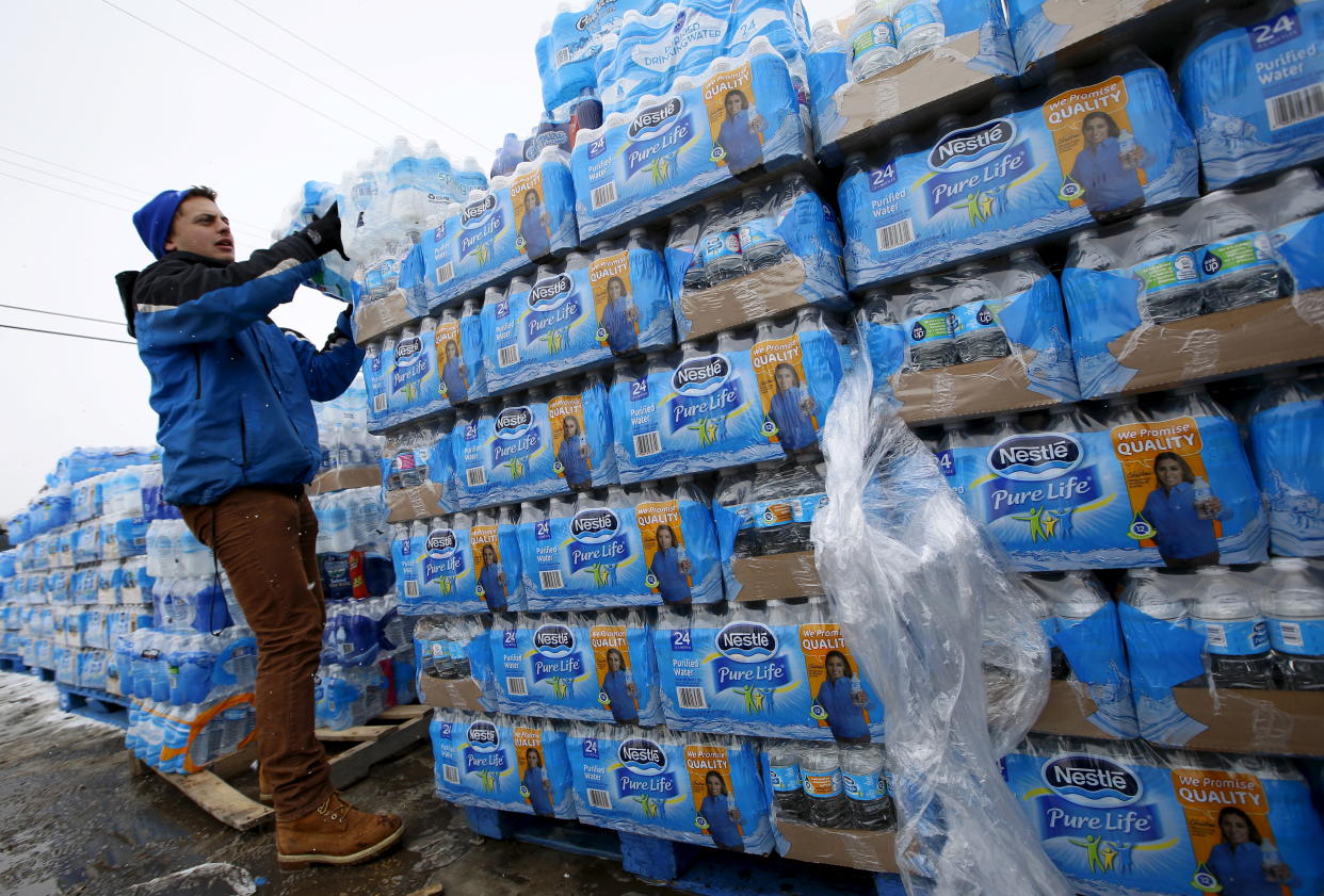 Volunteers distribute water in Flint, Michigan. America's lead-contaminated water problem is likely bigger than we currently think it is, according to a new USA Today analysis.