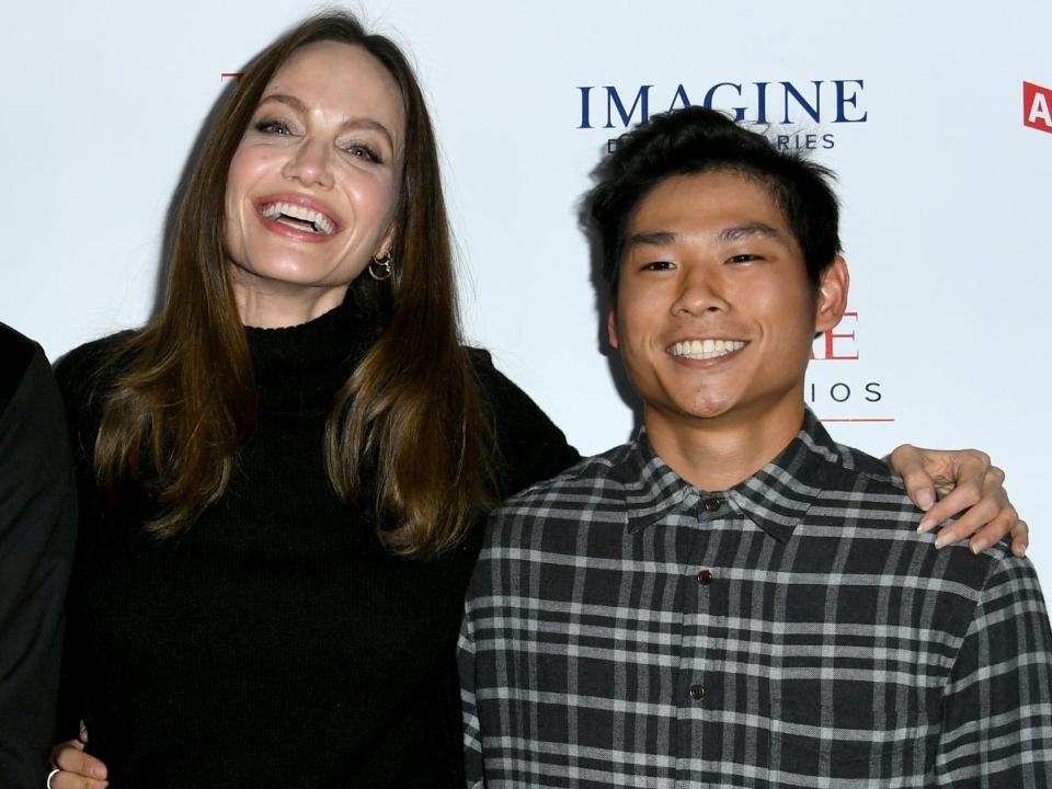 Angelina Jolie with Pax Thien Jolie-Pitt as the LA premiere of MSNBC Films' "Paper & Glue: A JR Project" at the Museum of Tolerance on November 18, 2021.