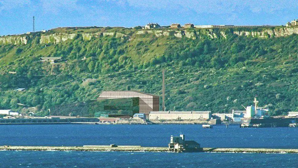 Computer generated image of a power plant and chimney with Portland Harbor in the foreground and the Portland Cliffs in the background 