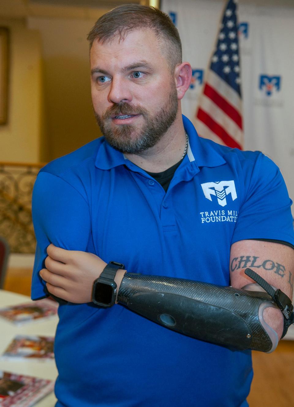 Retired U.S. Army Staff Sgt. and "recalibrated warrior" Travis Mills, of the Travis Mills Foundation, spoke Wednesday at La Cantina Italiana Restaurant in Framingham, Jan. 17, 2024.