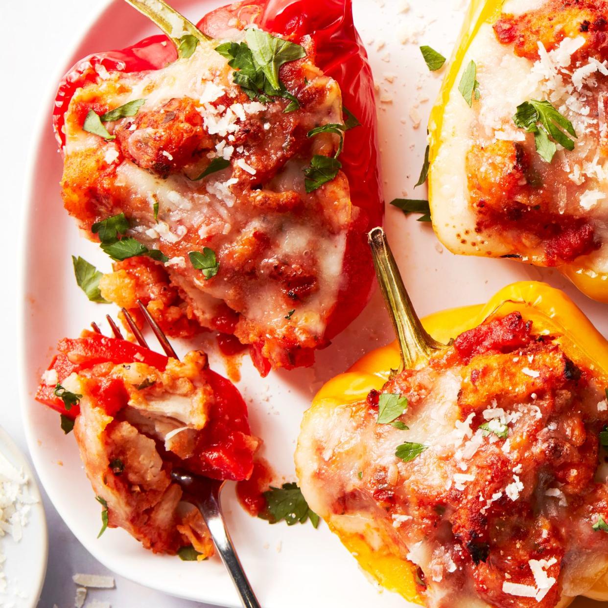 baked bell peppers stuffed with chicken, marinara sauce, and cheese