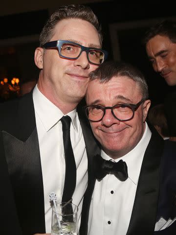 <p>Bruce Glikas/FilmMagic</p> Devlin Elliott and Nathan Lane in 2018