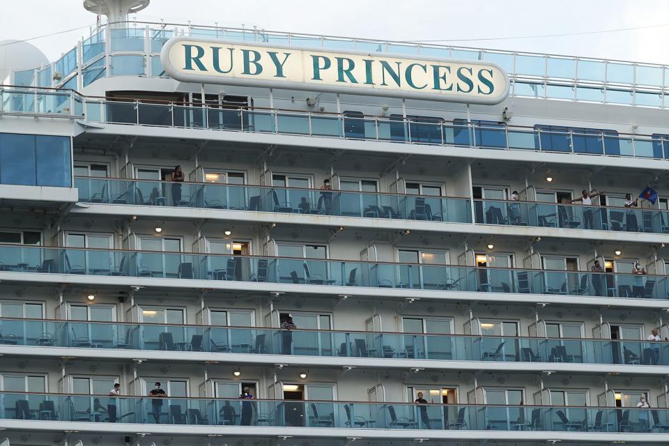 WOLLONGONG, AUSTRALIA - APRIL 23: The Ruby Princess cruise ship departs from Port Kembla on April 23, 2020 in Wollongong, Australia. Australian Border Force has ordered the Ruby Princess to depart Australian waters today, as two separate inquiries continue over how the ship's 2700 passengers were allowed to disembark in Sydney in March without adequate health checks during the coronavirus (COVID-19) pandemic. A special commission of inquiry has been established by the NSW government over the handling of the Ruby Princess' arrival into Sydney on 19 March, while NSW Police are also conducting a separate criminal investigation. There are now 21 deaths linked to the Ruby Princess along with more than 600 confirmed coronavirus (COVID-19) cases. (Photo by Mark Metcalfe/Getty Images)