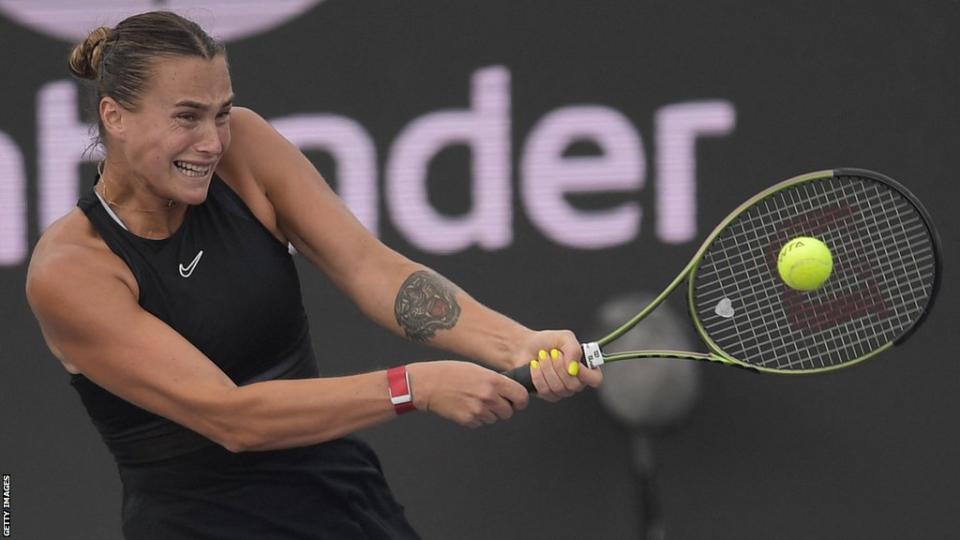 Belarus' Aryna Sabalenka returns the ball against Kazakhstan's Elena Rybakina