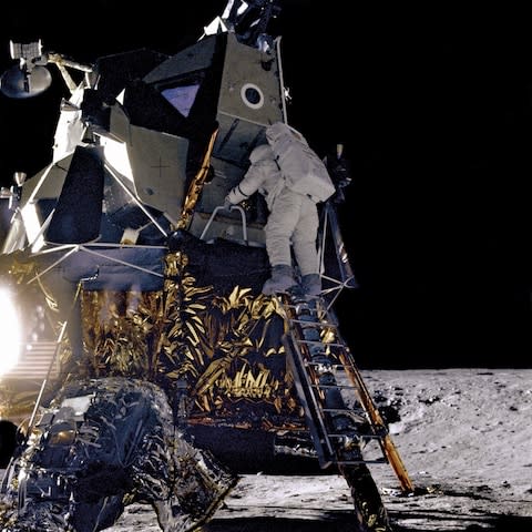 Alan L, Bean, lunar module pilot for the Apollo 12 mission, starts down the ladder of the lunar module  - Credit: Universal Images Group Editorial