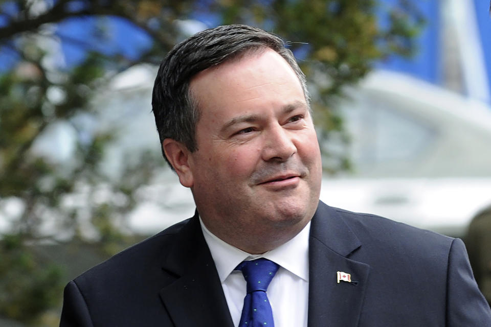 FILE - This June 9, 2015 file photo shows then-Canadian Defence Minister Jason Kenney in Warsaw, Poland. He is now the premier of Alberta. Alberta is investing $1.1 billion in the disputed Keystone XL pipeline, a project that Kenney says is crucial for the province's economy. (AP Photo/Alik Keplicz)