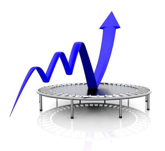 Blue charting arrow bouncing off a trampoline and pointing up.