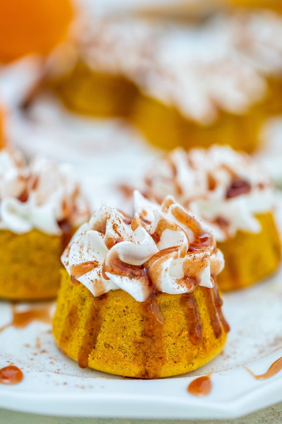 <p>There's an indulgent dulce de leche filling in these pumpkin cakes. It oozes out when you cut into them! 🤤 </p><p><strong>Get the recipe at <a href="https://sweetandsavorymeals.com/dulce-de-leche-stuffed-pumpkin-lava-cakes/" rel="nofollow noopener" target="_blank" data-ylk="slk:Sweet and Savory Meals;elm:context_link;itc:0;sec:content-canvas" class="link ">Sweet and Savory Meals</a>.</strong> </p>