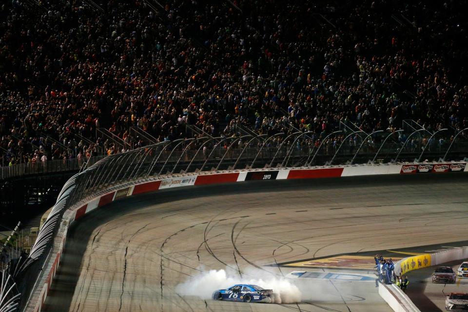 Martin Truex Jr. celebrates at Darlington (Getty). 