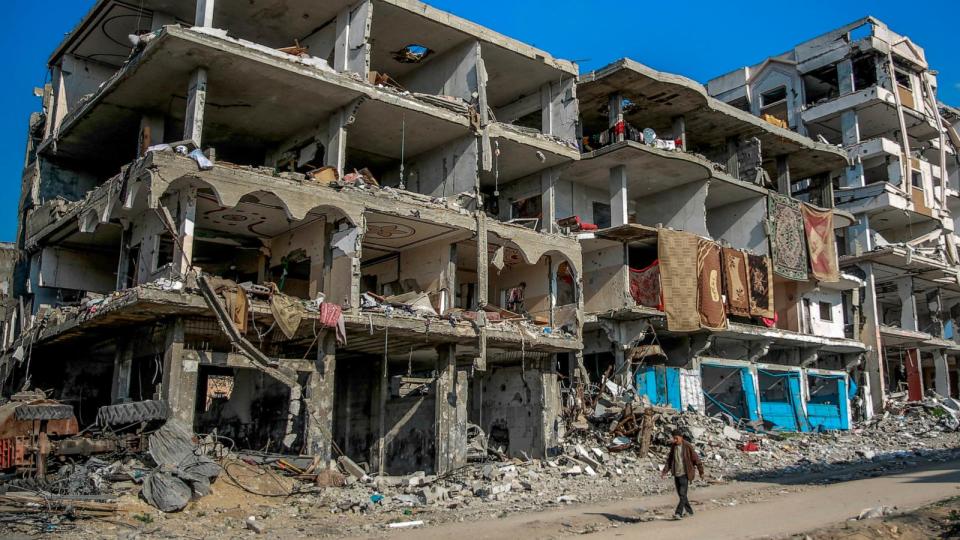 PHOTO: A Palestinian man walks past destroyed buildings in Beit Lahia, northern Gaza, Feb. 26, 2024, amid continuing battles between Israel and the Palestinian militant group Hamas.  (AFP via Getty Images)