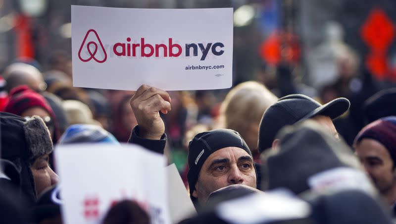 Supporters of Airbnb hold a rally outside City Hall in New York, Jan. 20, 2015. A New York judge on Tuesday, Aug. 8, 2023 dismissed lawsuits filed by Airbnb and three hosts over New York City’s rules for short-term rentals, saying the restrictions are “entirely rational.”