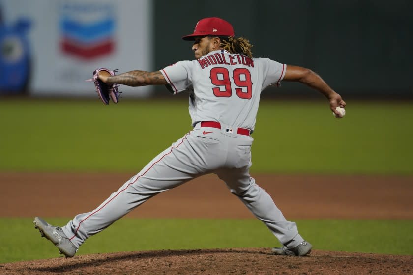 Los Angeles Angels relief pitcher Keynan Middleton (99) throws against the San Francisco Giants during the eighth inning of a baseball game in San Francisco, Wednesday, Aug. 19, 2020. (AP Photo/Jeff Chiu)