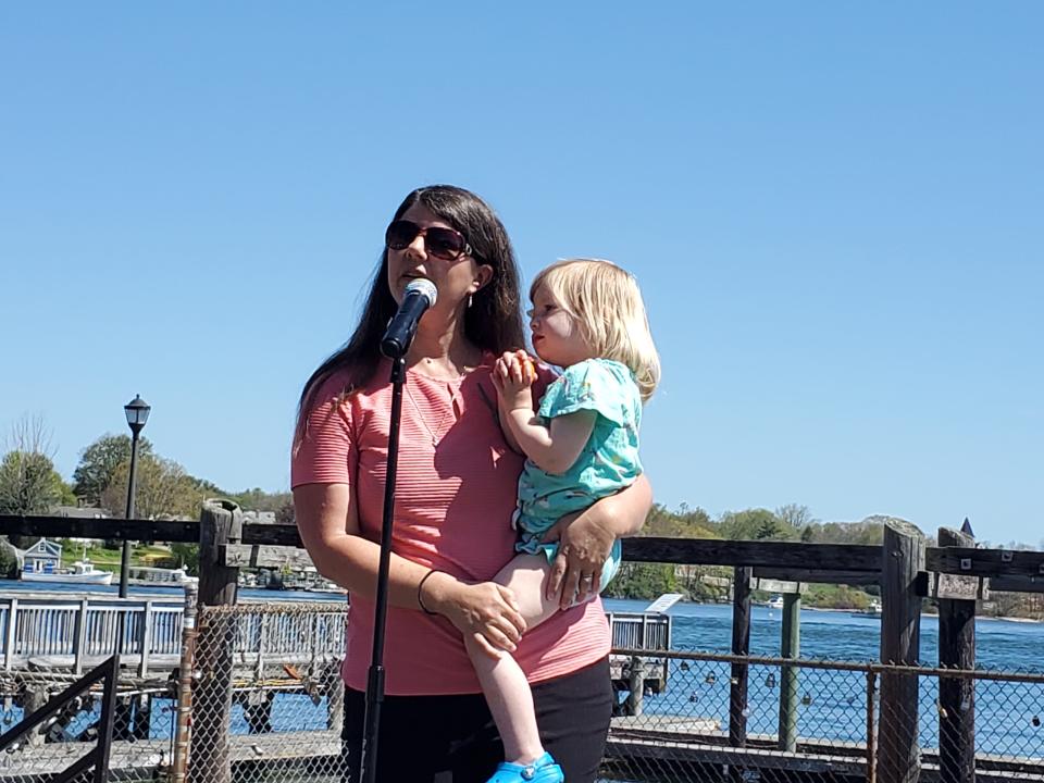 State Sen. Rebecca Perkins Kwoka, D-Portsmouth, with her daughter Logan at the abortion rights rally at Prescott Park Saturday, May 14, 2022.