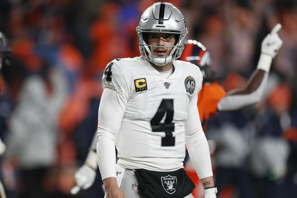 Oakland Raiders quarterback Derek Carr reacts after missing a two-point attempt during the second half of an NFL football game against the Denver Broncos, Sunday, Dec. 29, 2019, in Denver. (AP Photo/David Zalubowski)