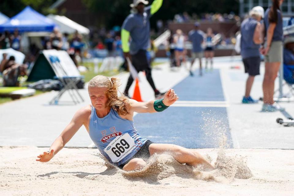 West Jessamine’s Lillian Hodge takes flight in the triple jump to take second place during the KHSAA Track & Field State Championship at the UK Track and Field complex in Lexington, Ky., Saturday, June 3, 2023.