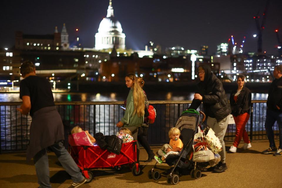 St Paul’s is the backdrop as queues progress despite the late or early hour (REUTERS)