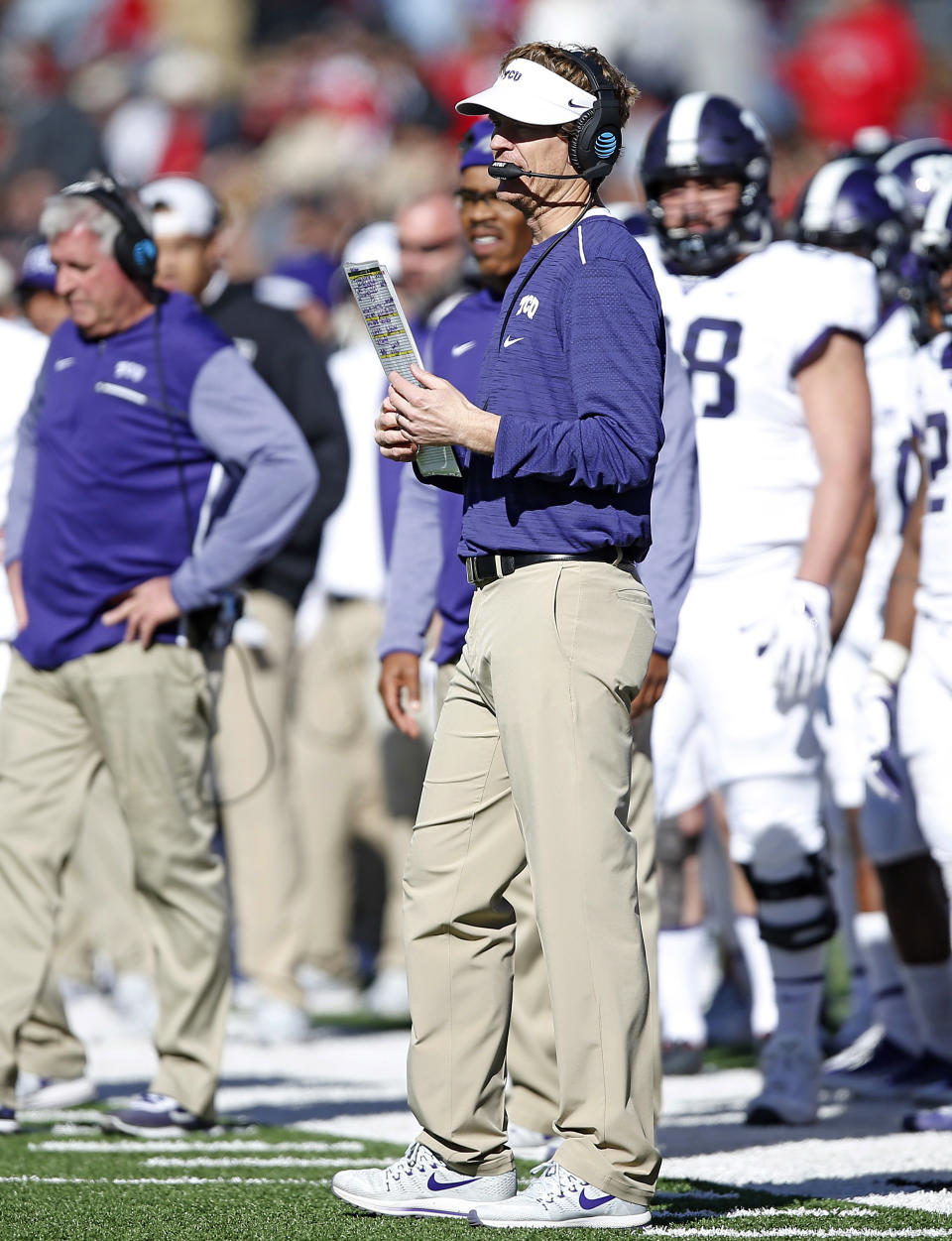 FILE - TCU offensive coordinator Sonny Cumbie waits for the time out during the second half of the NCAA college football game against Texas Tech in Lubbock, Texas, in this Saturday, Nov. 18, 2017, file photo (AP Photo/Brad Tollefson, File)