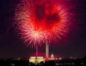 <p>Fireworks explode over Lincoln Memorial, Washington Monument and U.S. Capitol, along the National Mall in Washington, Wednesday, July 4, 2018, during the Fourth of July celebration. (Photo: Jose Luis Magana/AP) </p>