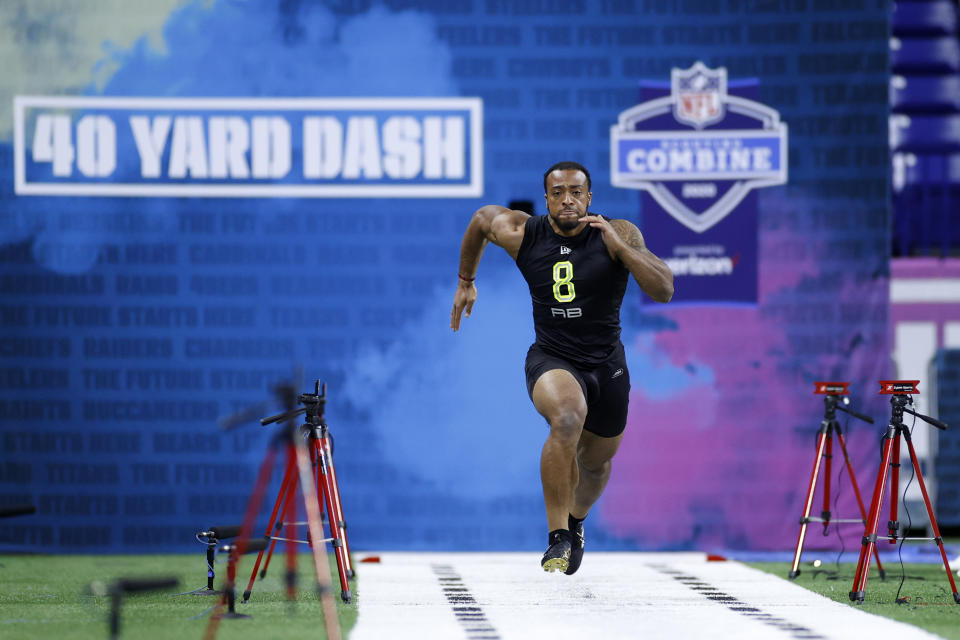 Running back A.J. Dillon of Boston College runs the 40-yard dash during the NFL Combine 