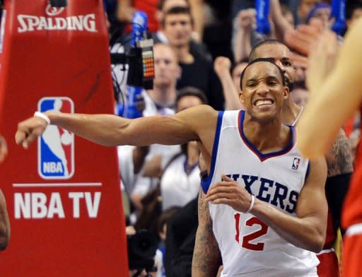 Evan Turner of the Philadelphia 76ers celebrates his team's 79-74 win over the Chicago Bulls in game three of the Eastern Conference first-round NBA playoff series on May 4