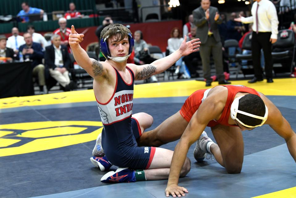Wyatt Hinton signals victory to the fans of Norwood after winning the Division III 138-pound title at the 2024 OHSAA Wrestling State Tournament, Columbus, Ohio, March 10, 2024.