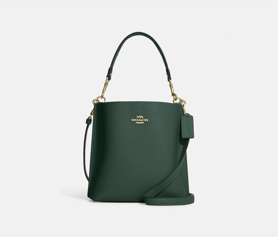 Mollie Bucket Bag 22 in everglade (Photo via Coach Outlet)